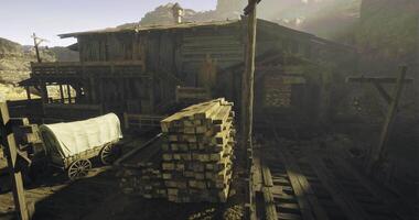 CGI Old wooden structure with stacked timber and wagon in a rustic setting video