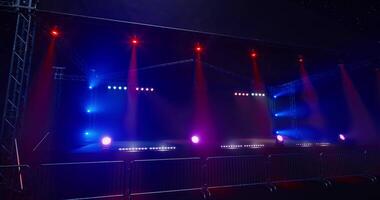 CGI Festival stage setup featuring colorful lights at night video