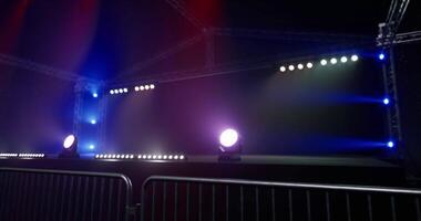 CGI Stage setup with colorful lights prepared for an event in an indoor venue video
