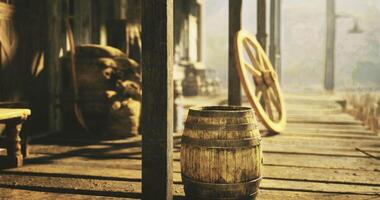 CGI Rustic wooden barrel near an old building on a foggy morning video