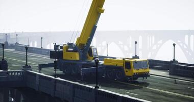 CGI Heavy machinery performing maintenance work on a bridge during cloudy weather video
