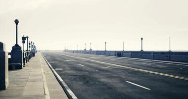 CGI Wide empty road on a seaside promenade during overcast weather video