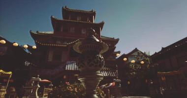CGI Ancient architecture illuminated by lanterns during a vibrant festival at dusk video