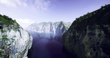 CGI Breathtaking view of cliffs and tranquil waters at dawn in a serene landscape video