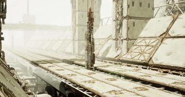 CGI Futuristic industrial landscape with towering structures in foggy atmosphere video