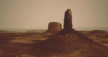 CGI Monumental rock formation in a vast desert landscape during sunset hours video