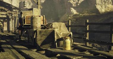 CGI Rustic wooden mine setting with tools and supplies under natural lighting video