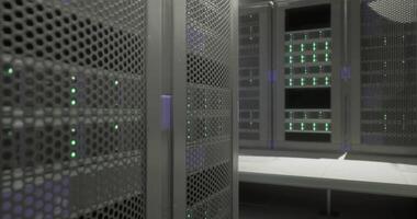 CGI Data center with multiple server racks illuminated by green lights video