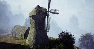 CGI Historic windmill stands tall in a serene countryside landscape during twilight video