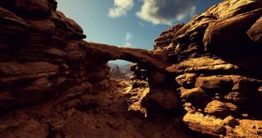 CGI Scenic view of a natural arch in a desert landscape at midday video
