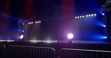 CGI Lighting setup at an event venue featuring bright stage lights and barriers video