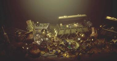 CGI Treasure trove filled with ancient artifacts and golden objects in dim light video