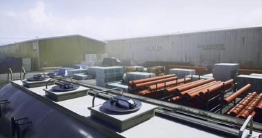 CGI Industrial storage yard with stacked materials and machinery in clear weather video