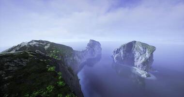 CGI View of rocky islands surrounded by calm waters under a cloudy sky video