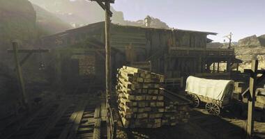 CGI Old wooden structure with stacked timber and wagon in a mining area video