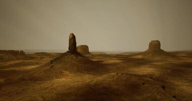 CGI Monument Valley landscape with rock formations under a hazy sky at twilight video