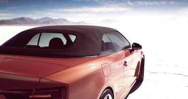 CGI Model of convertible car parked on a salt flat in bright sunlight video