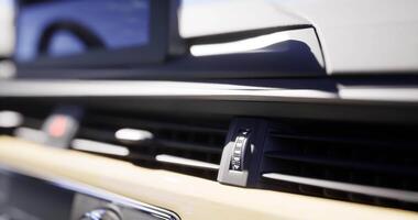 CGI Close view of modern car dashboard control features during daylight video