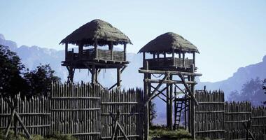 CGI Watchtowers and wooden fortifications in a serene landscape during daylight video