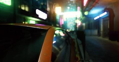 CGI Neon lights illuminate a vibrant urban alley at night with a parked car video
