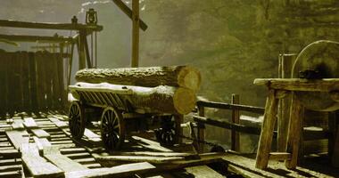 CGI Wooden logs on a cart in a rustic workshop during daylight video
