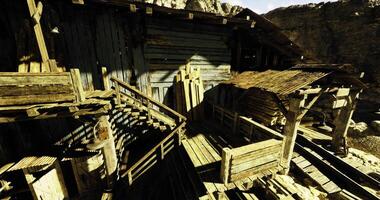 CGI Old wooden structure in a secluded area surrounded by rocks and nature video