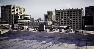 CGI Rooftop view of city buildings under blue sky on a sunny day video
