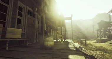 CGI Old wooden building in a deserted western town during golden hour video