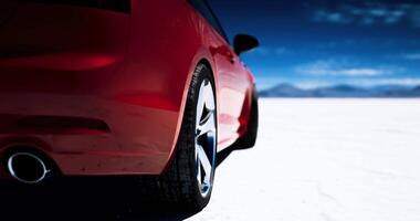 CGI Sports car parked on vast white salt flats with mountains in background video