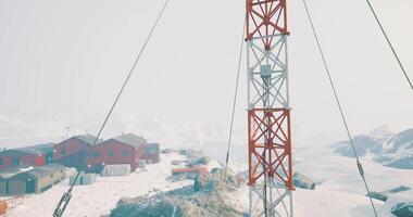CGI Winter landscape with research station and communication tower in snowy terrain video