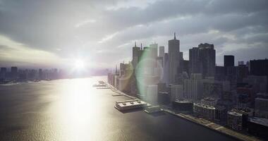 CGI Sunset skyline view of city with river reflecting light and buildings video