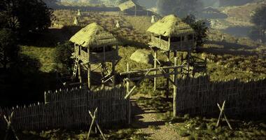 CGI Historic wooden fort with towers and gate in a natural setting video