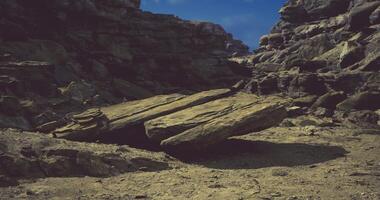 CGI Unusual rock formation in a desert landscape under a clear blue sky video