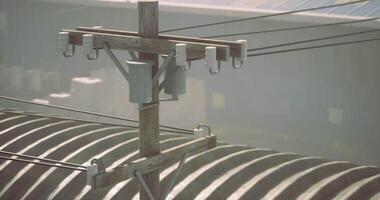 CGI Utility pole with power lines in a hazy industrial setting video