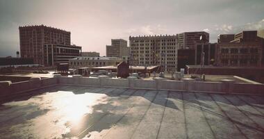 CGI Urban skyline view from a rooftop during sunset in a city video