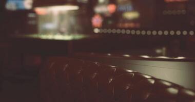 CGI Cozy bar interior with dim lighting and leather seating for evening relaxation video