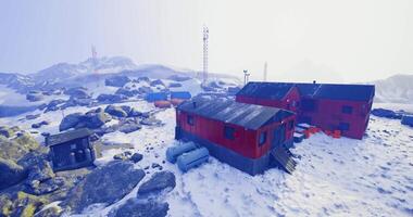 CGI Research station in snowy landscape with communication towers in winter video