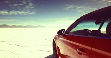 CGI Red car parked on an expansive salt flat during bright daylight video