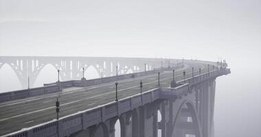CGI Fog envelops long bridge creating an atmospheric view in a quiet setting video
