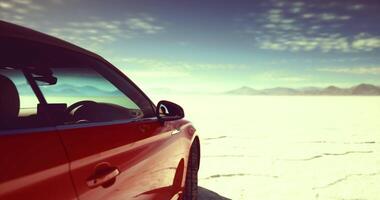 CGI Driving on a vast salt flat under a clear blue sky in the afternoon video