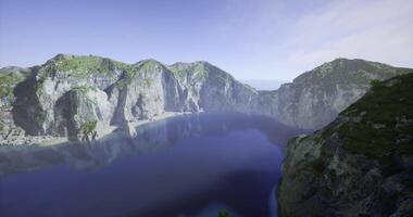 CGI Stunning view of a calm lagoon flanked by cliffs and lush foliage video