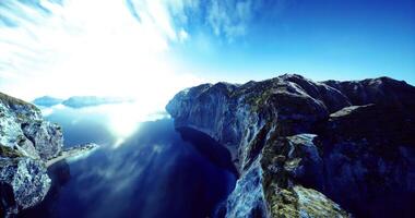CGI Breathtaking view of serene waters and majestic cliffs during a sunny day video