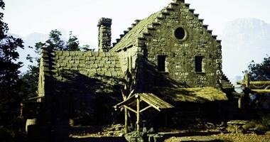 CGI Old stone cottage surrounded by trees in a mountainous landscape video
