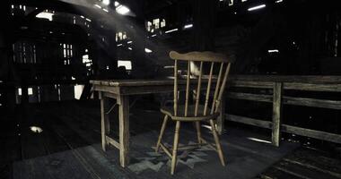 CGI Rustic wooden chair and table under soft light in old barn video