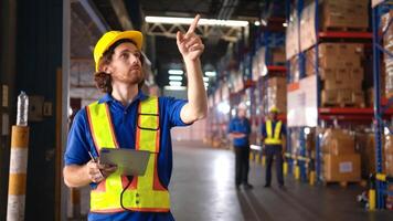 Portrait of warehouse workers are reviewing the list of items based on the documentation,139 photo