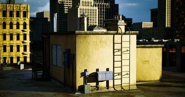 CGI Urban rooftop with ladder and utility structures in late afternoon light video