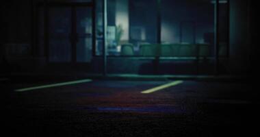 CGI Nighttime view of an empty parking lot with faint light from nearby buildings video