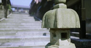 CGI Stone lantern by the stairs of an ancient temple during the day video