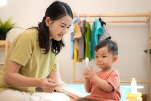 Little boy with breakfast with mom feeding him before bathing,170 photo