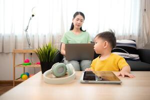 While in vacation at home, a mother engages in activities with little kid,98 photo